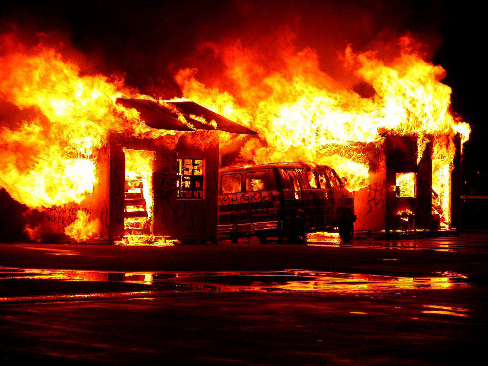 Burning house and van
