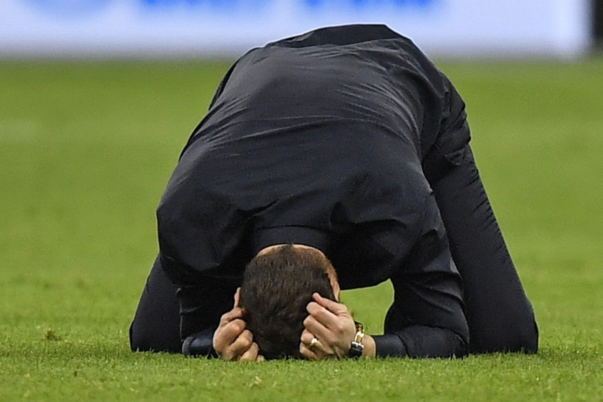 Mauricio Pochettino crying on the pitch